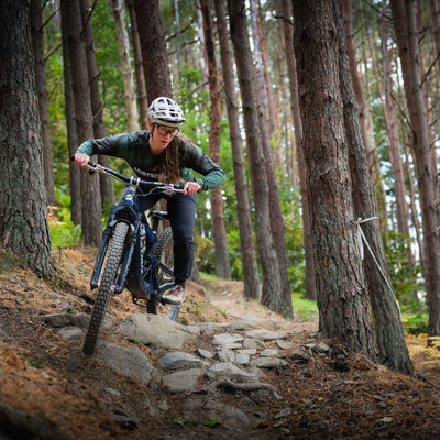 Dirt School coach Fi riding Innerleithen downhill mountain bike trails